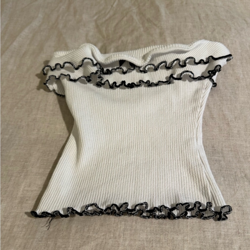 Blue Blush Ivory Top with Black Ruffle Accents